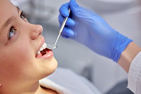 Dentist having teeth checked in Juno Beach