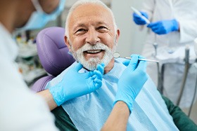 Man smiling with dentures